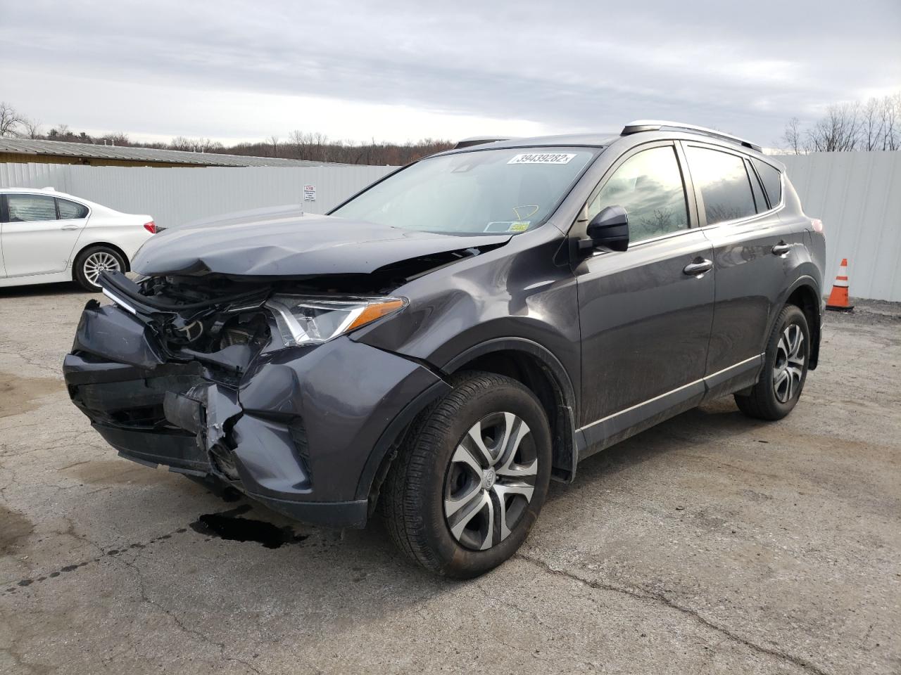 Photo 2 from auction – 2017 TOYOTA RAV4 LE with VIN JTMBFREV4HJ139327
