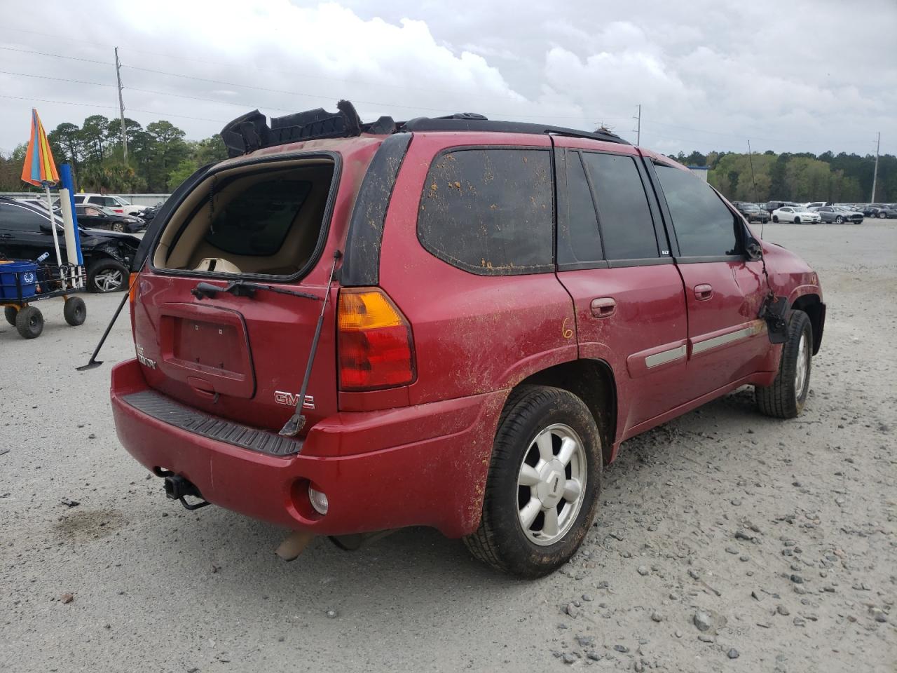 Photo 4 from auction – 2004 GMC ENVOY with VIN 1GKDS13S642418527