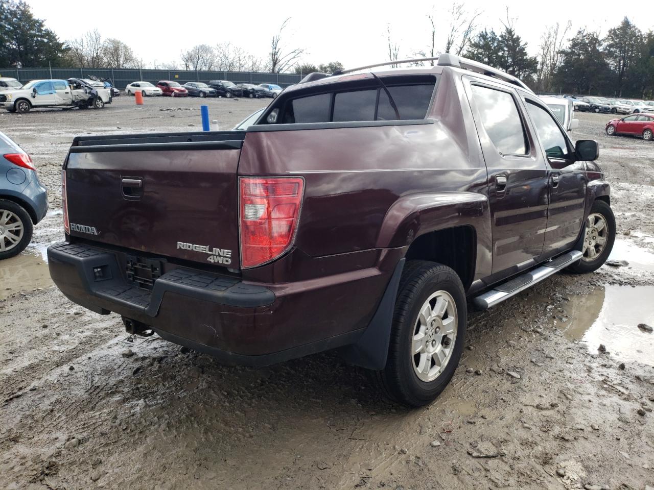 Photo 4 from auction – 2010 HONDA RIDGELINE with VIN 5FPYK1F41AB002508