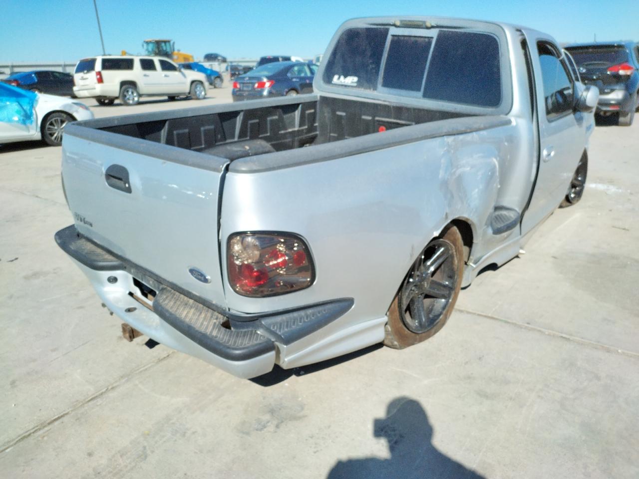 Photo 4 from auction – 2004 FORD F150 SVT L with VIN 2FTRF07354CA66239