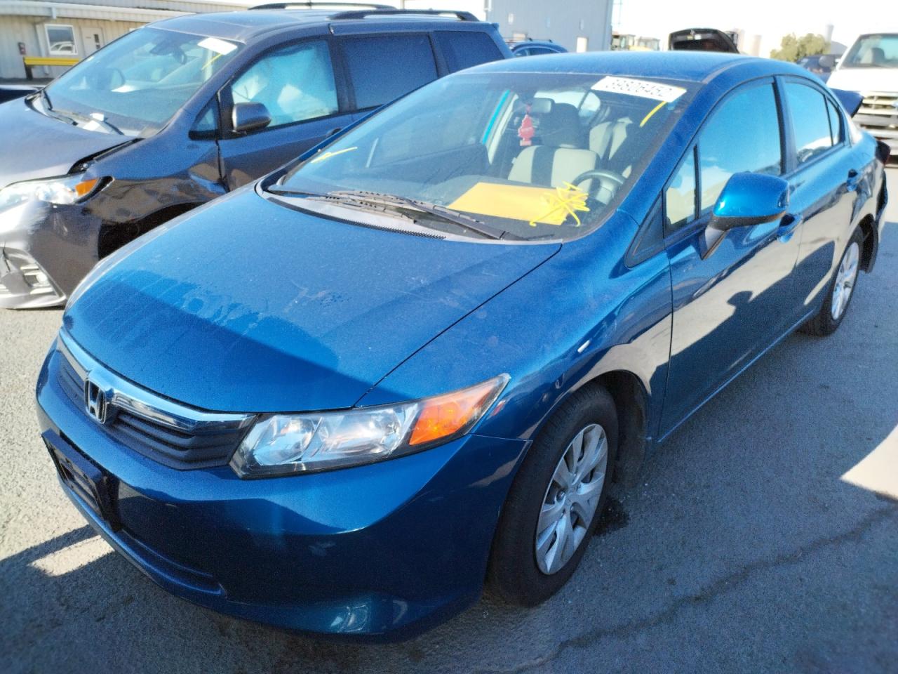 Photo 2 from auction – 2012 HONDA CIVIC LX with VIN 19XFB2F51CE367794