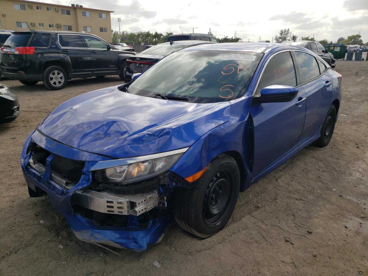 Photo 2 from auction – 2016 HONDA CIVIC LX with VIN 19XFC2F57GE010798