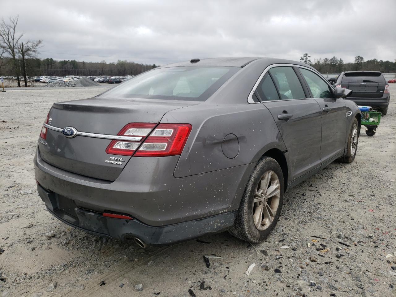 Photo 4 from auction – 2013 FORD TAURUS SEL with VIN 1FAHP2E8XDG146143