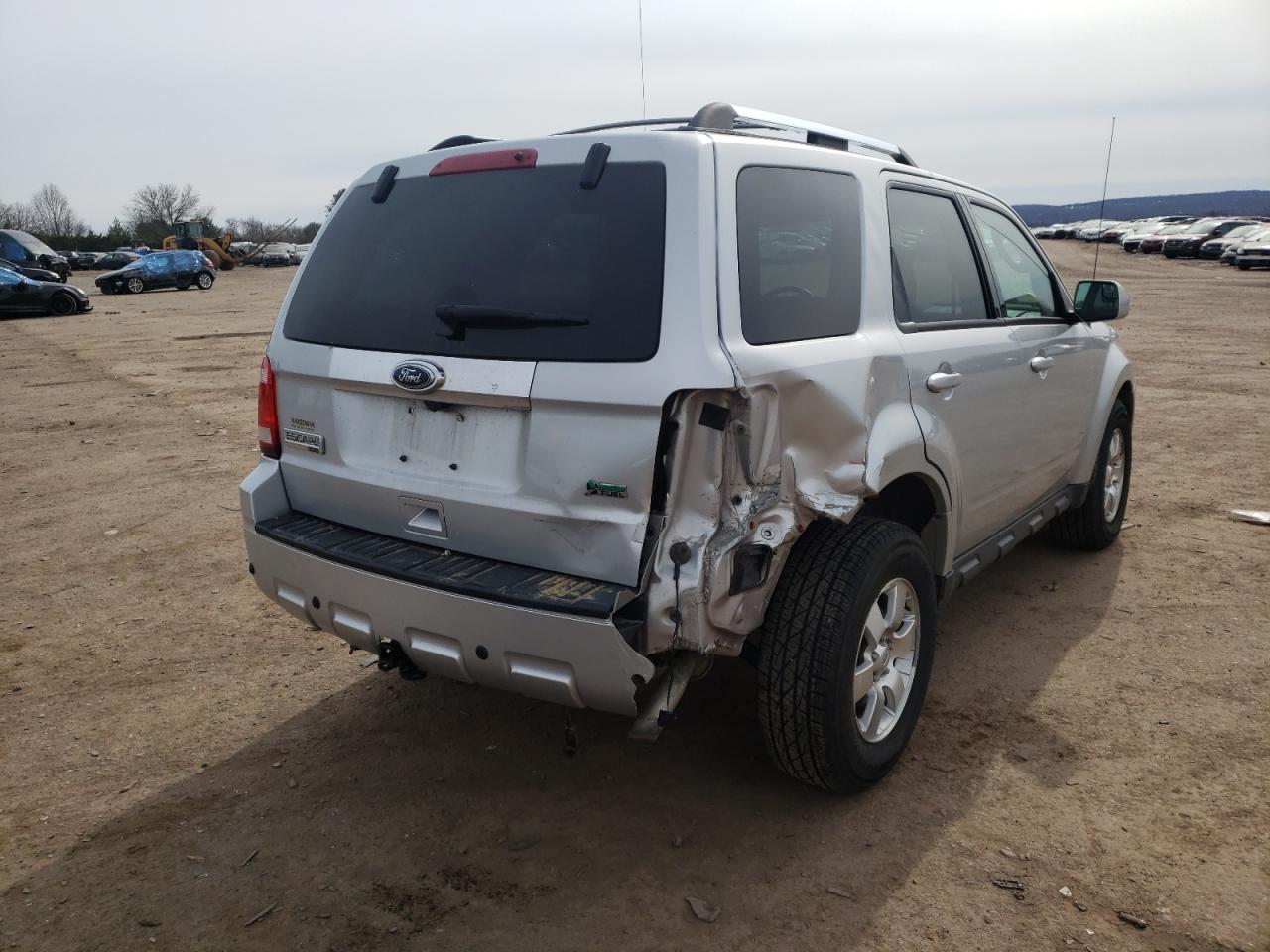 Photo 4 from auction – 2010 FORD ESCAPE LIM with VIN 1FMCU9EG9AKB50234