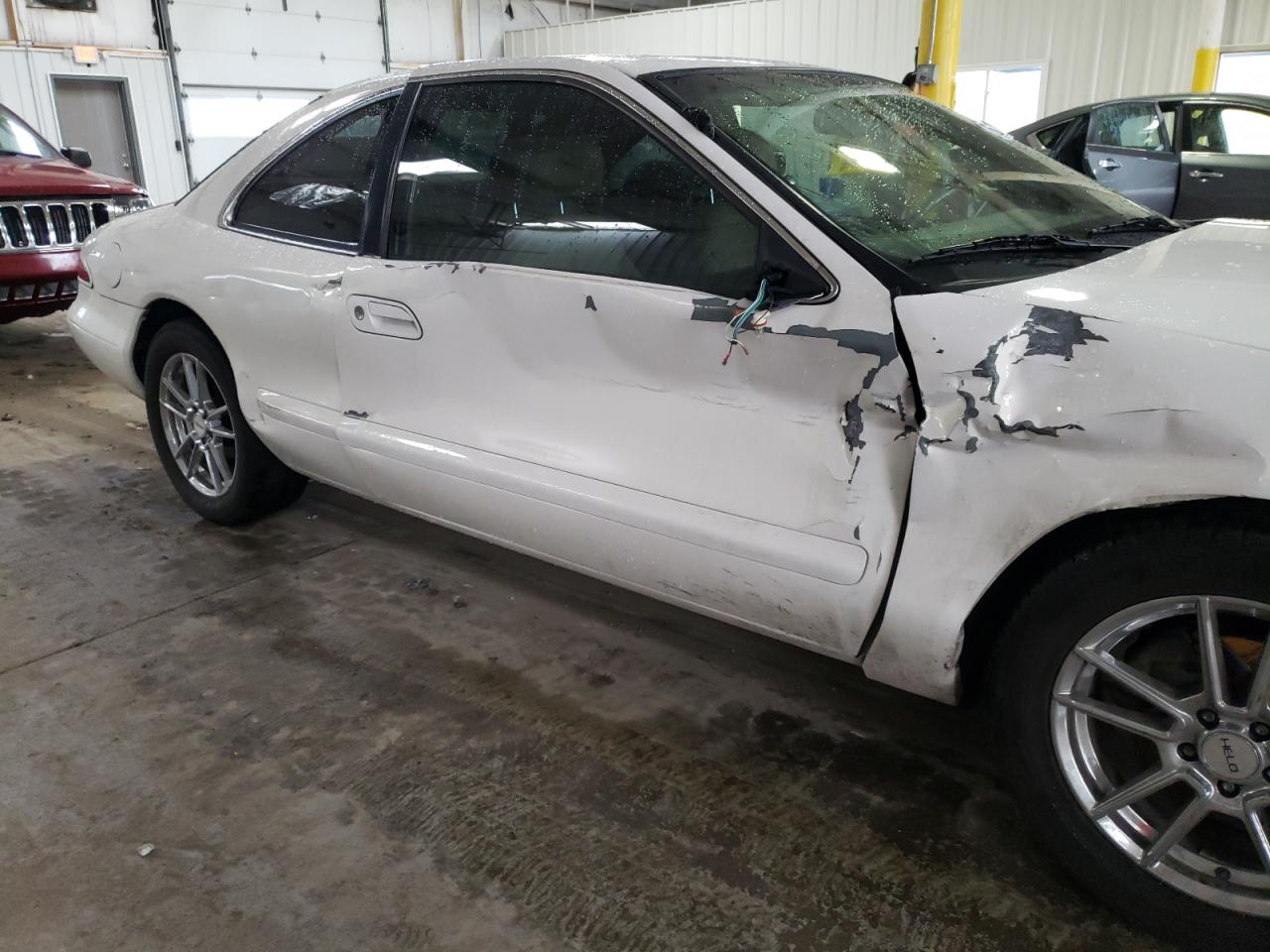 Photo 9 from auction – 1998 LINCOLN MARK VIII with VIN 1LNFM92V1WY685787