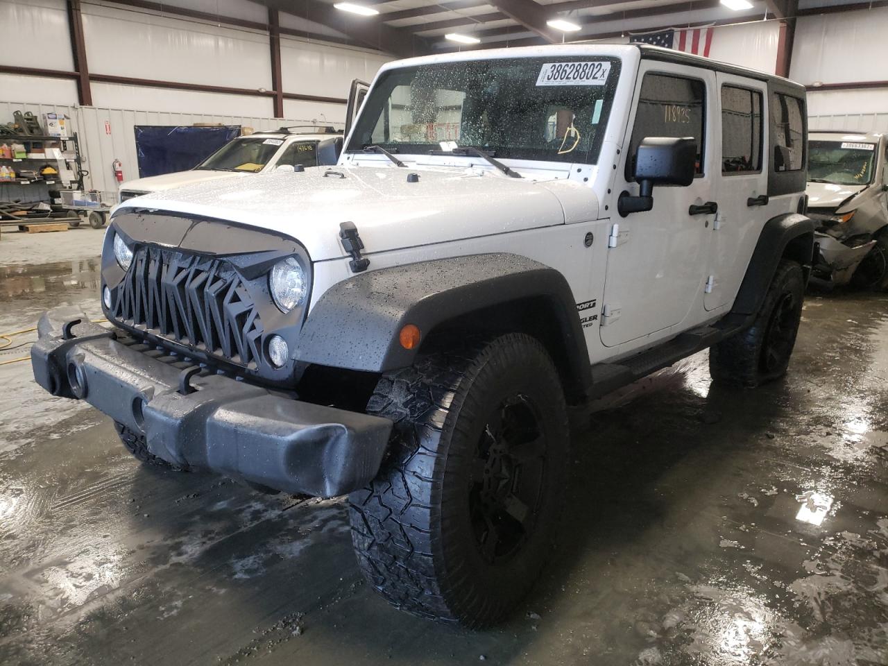 Photo 2 from auction – 2014 JEEP WRANGLER U with VIN 1C4BJWDG7EL207863