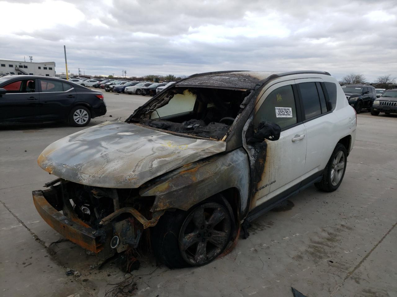 Photo 2 from auction – 2015 JEEP COMPASS LA with VIN 1C4NJDEBXFD333506