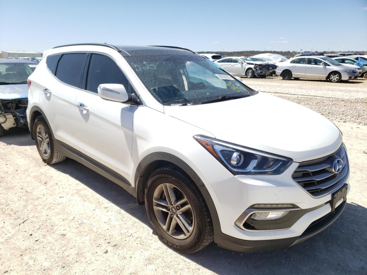 HYUNDAI SANTA FE S 2018 with VIN 5NMZU3LB0JH064454 - Photo from auction