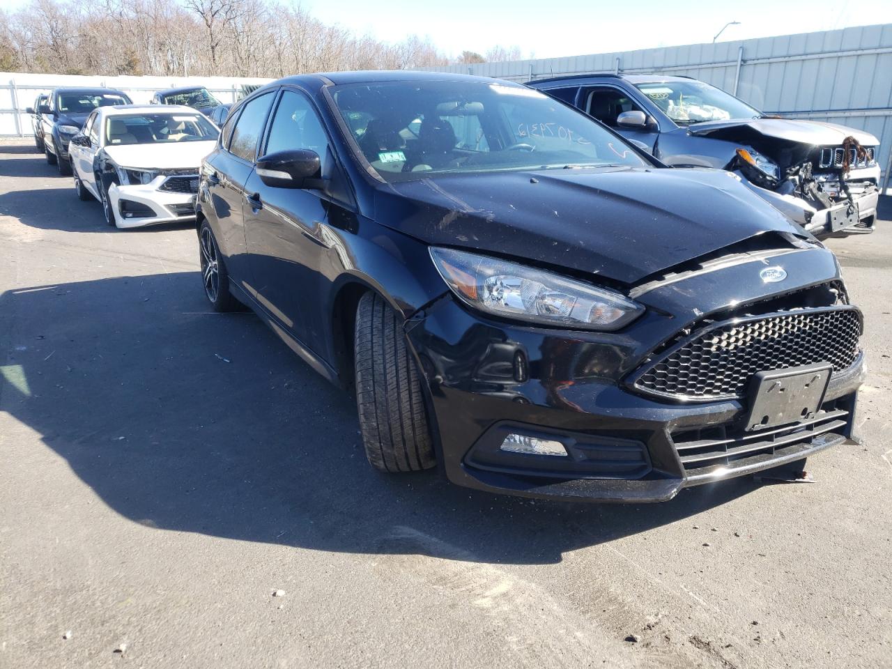 FORD FOCUS ST 2016 with VIN 1FADP3L99GL278998 - Photo from auction