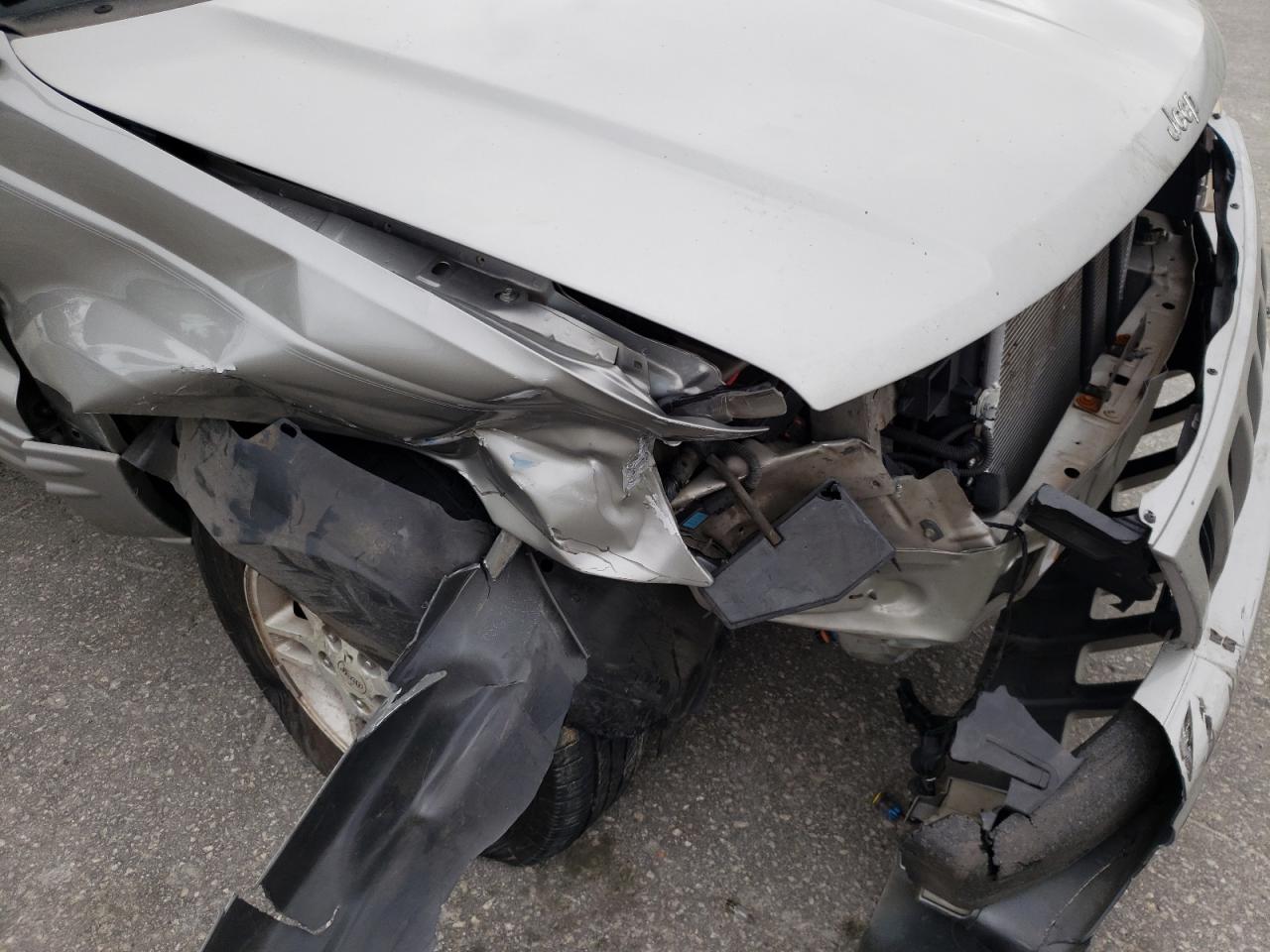 Photo 9 from auction – 2000 JEEP CHEROKEE with VIN 1J4GW58S1YC267992