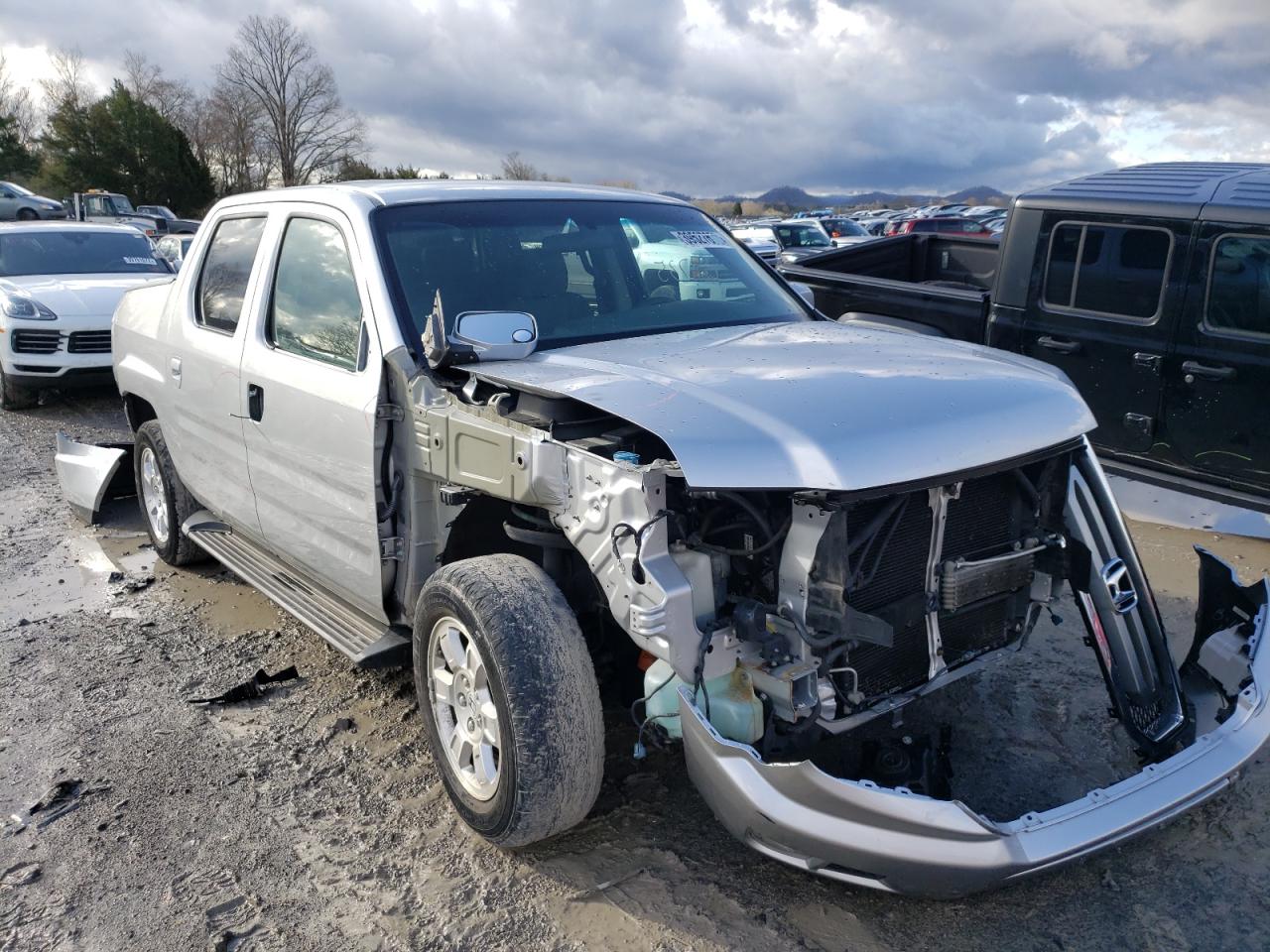 HONDA RIDGELINE 2011 with VIN 5FPYK1F48BB004726 - Photo from auction