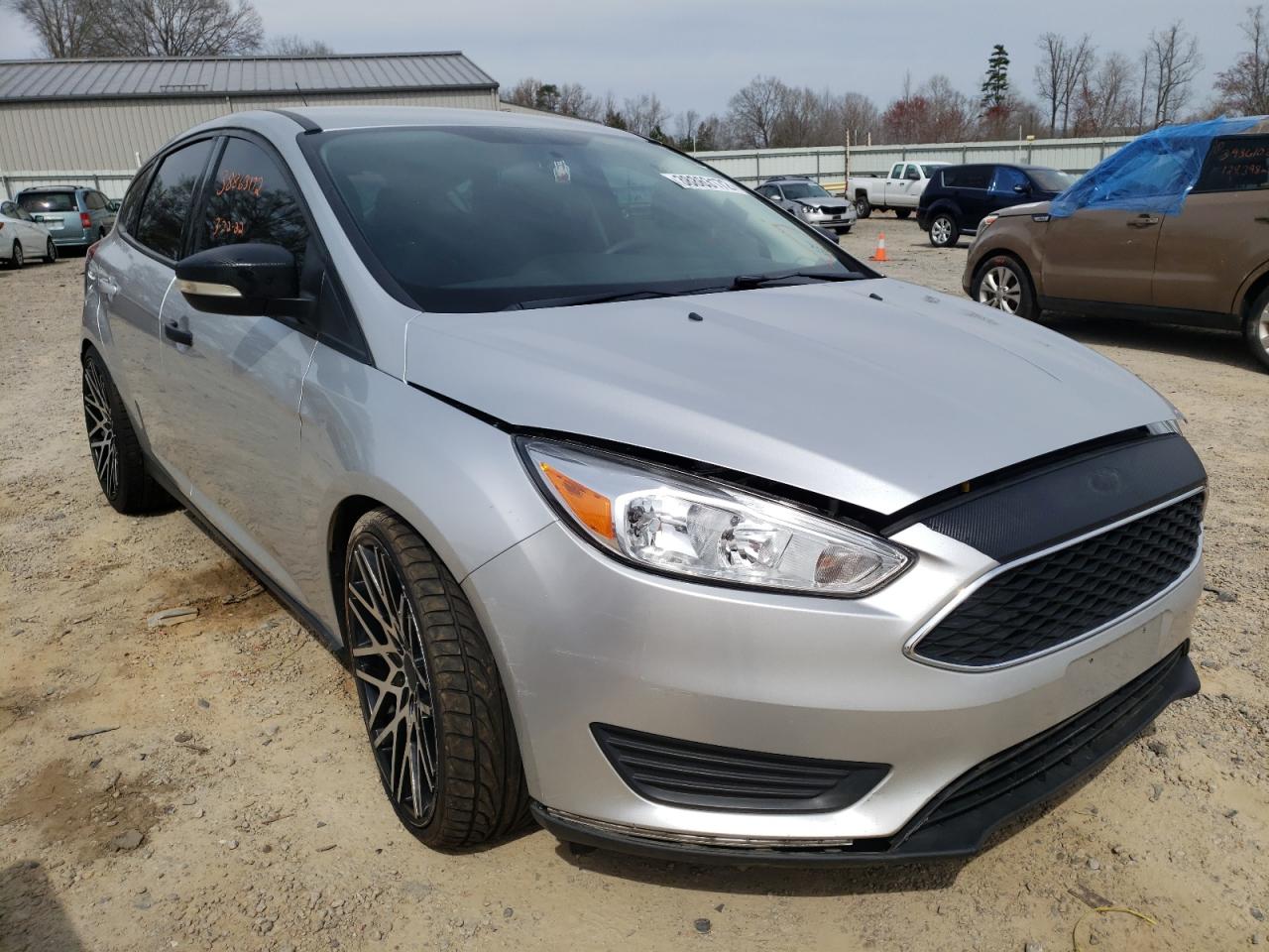 FORD FOCUS SE 2016 with VIN 1FADP3K25GL255268 - Photo from auction