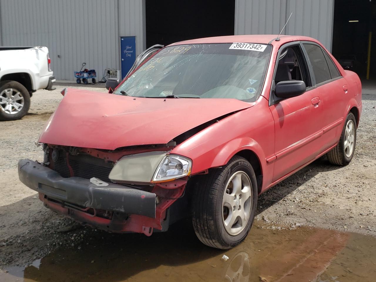 Photo 2 from auction – 1999 MAZDA PROTEGE ES with VIN JM1BJ2215X0148405