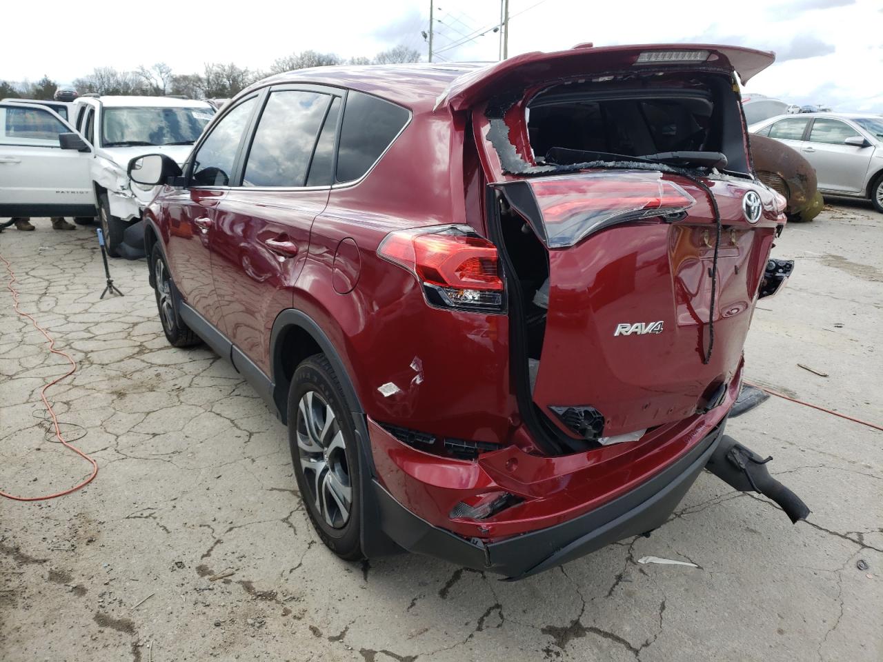 Photo 3 from auction – 2018 TOYOTA RAV4 LE with VIN 2T3BFREV6JW736650