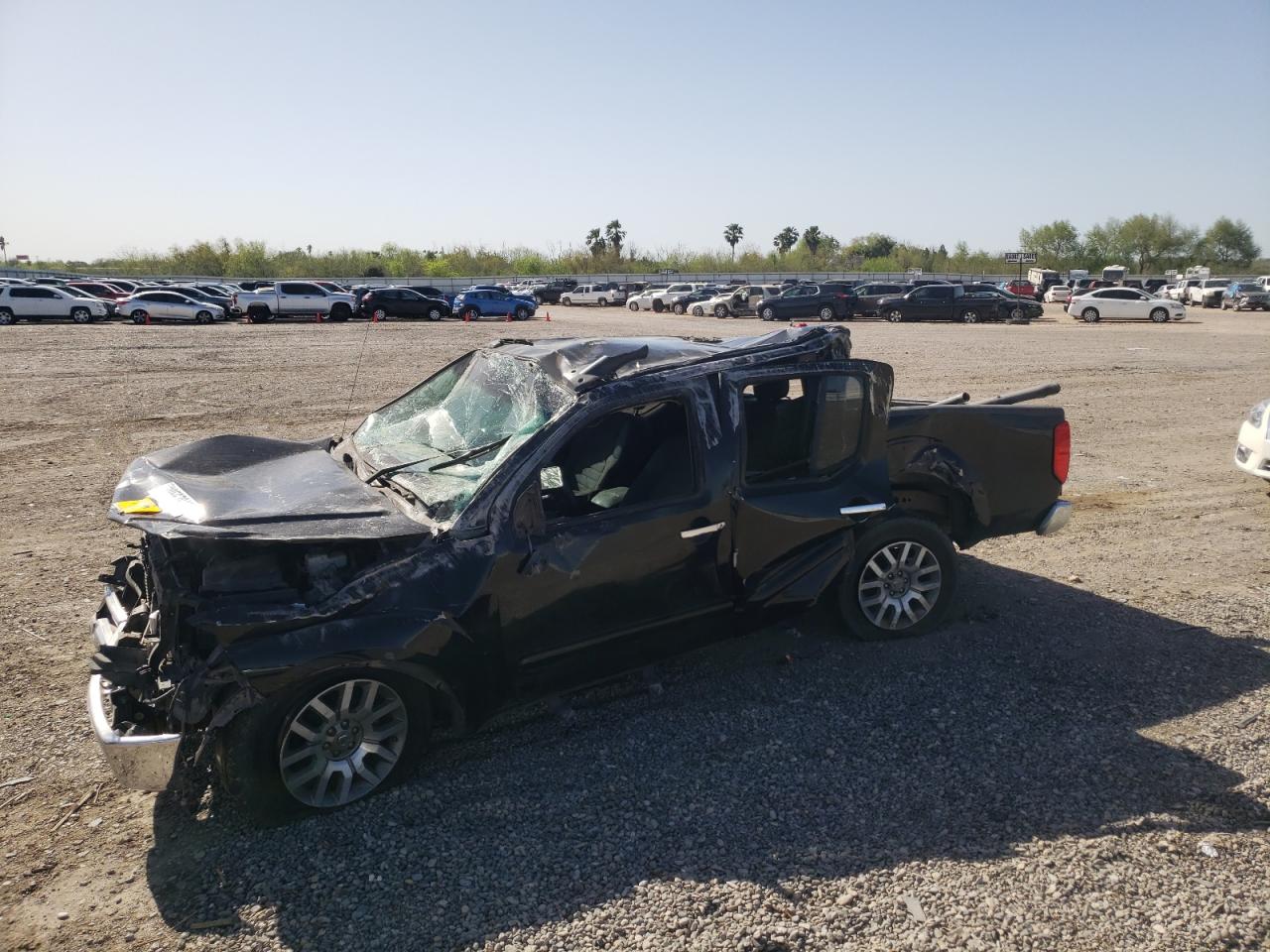 Photo 9 from auction – 2009 NISSAN FRONTIER C with VIN 1N6AD07U49C415512