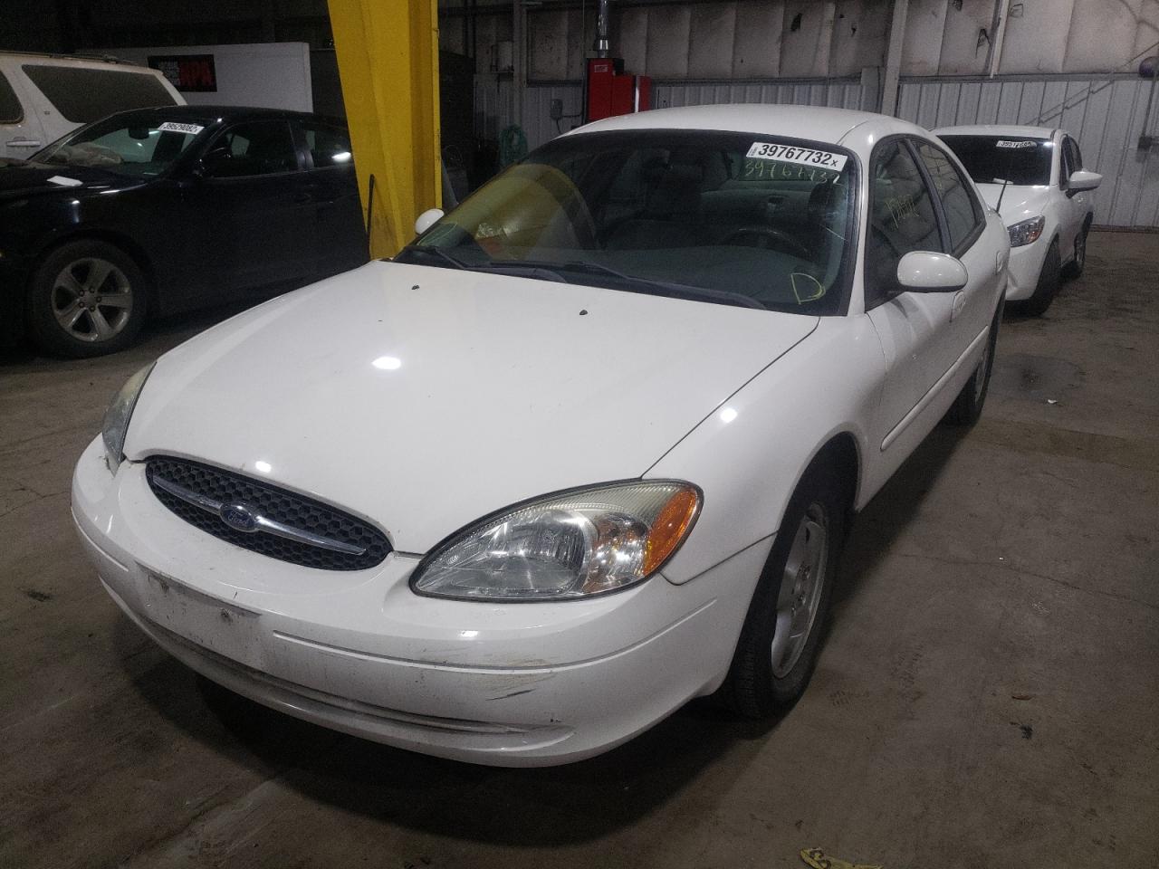 Photo 2 from auction – 2002 FORD TAURUS with VIN 1FAFP53U22G165744