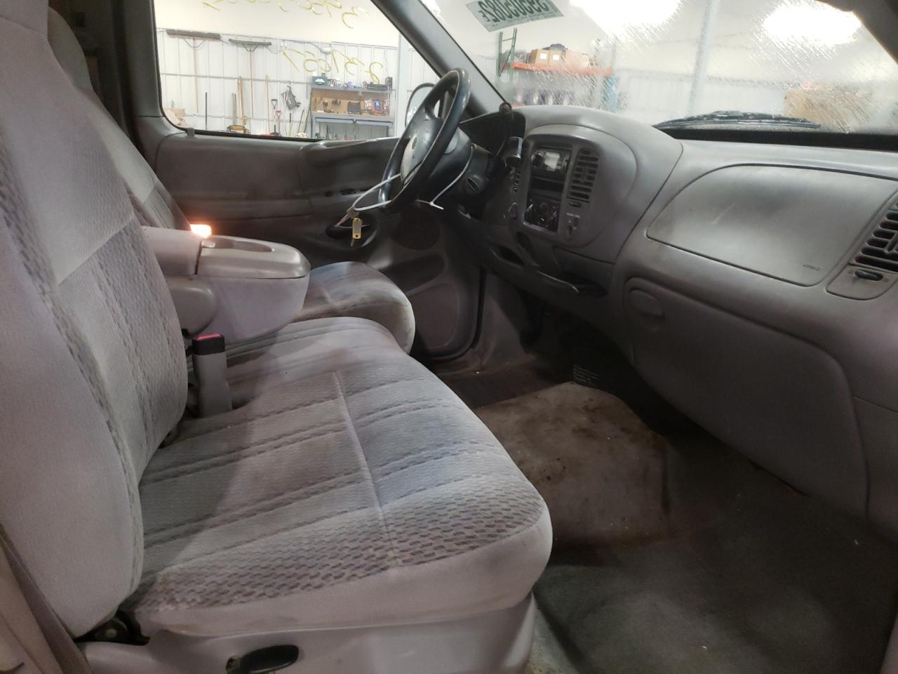 Photo 5 from auction – 1997 FORD F150 with VIN 1FTDX18W0VKB95525