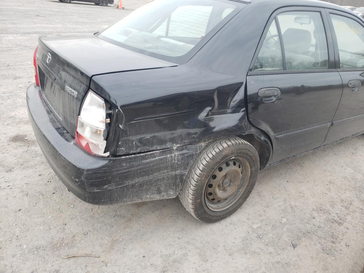Photo 9 from auction – 2000 MAZDA PROTEGE DX with VIN JM1BJ2229Y0267634