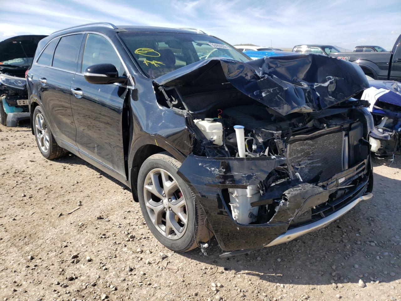 KIA SORENTO SX 2016 with VIN 5XYPK4A53GG166947 - Photo from auction
