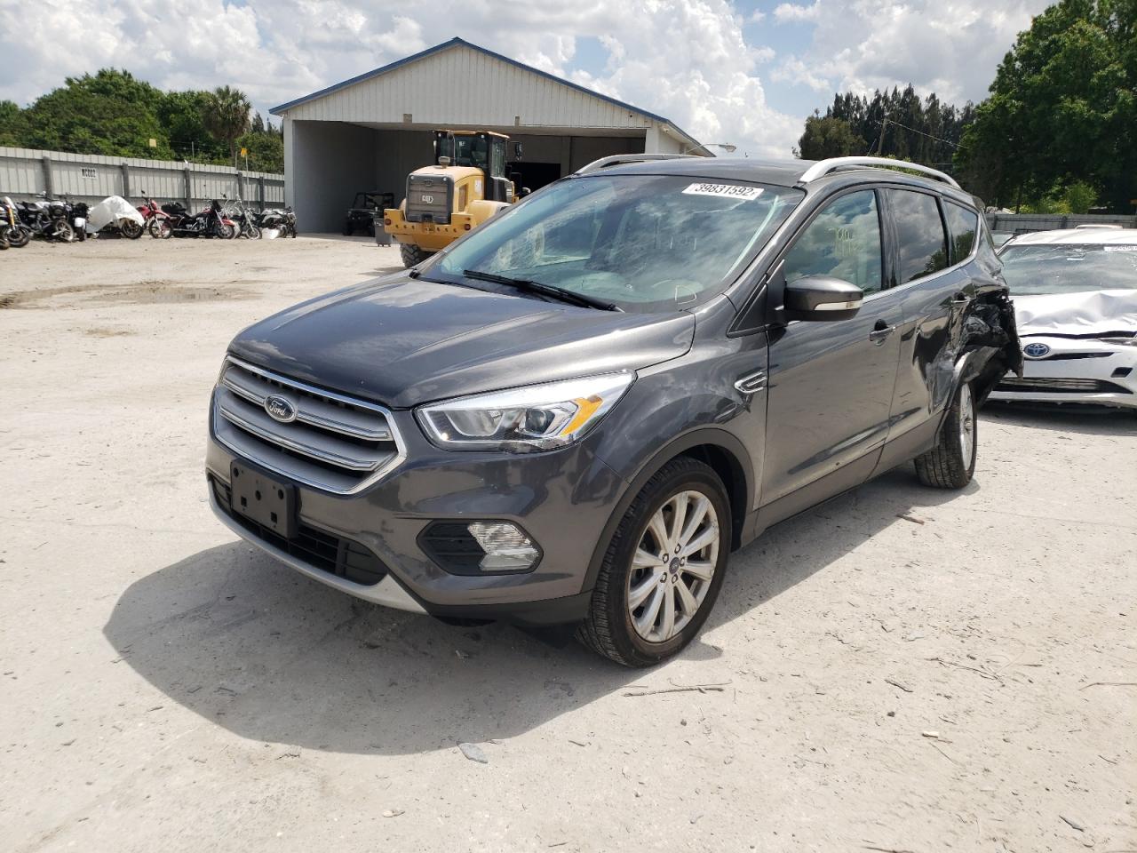 Photo 2 from auction – 2017 FORD ESCAPE TIT with VIN 1FMCU0J92HUB20042