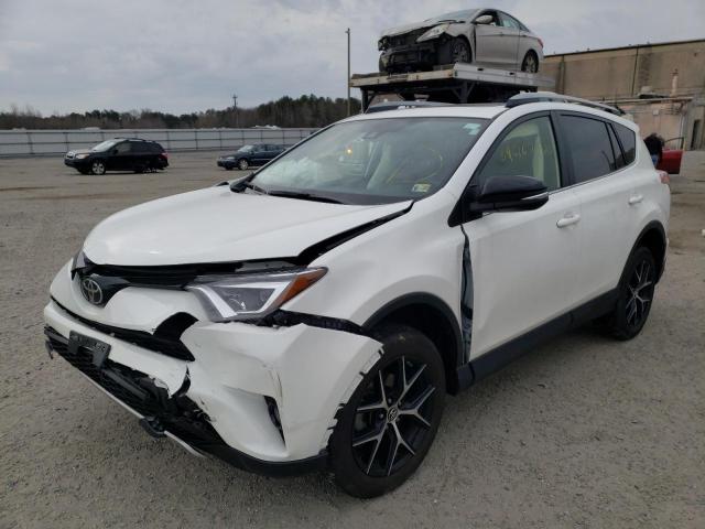 Photo 2 from auction – 2018 TOYOTA RAV4 SE with VIN JTMJFREV3JJ256821
