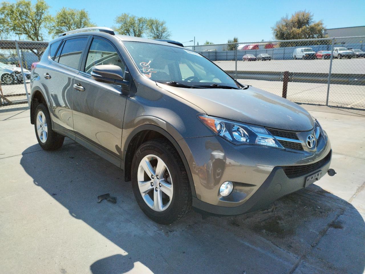 TOYOTA RAV4 XLE 2014 with VIN JTMRFREV2ED084398 - Photo from auction