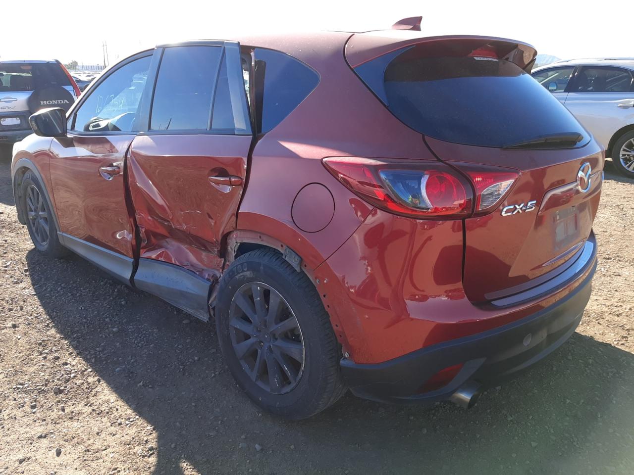 Photo 3 from auction – 2013 MAZDA CX-5 TOURI with VIN JM3KE2CE3D0131109