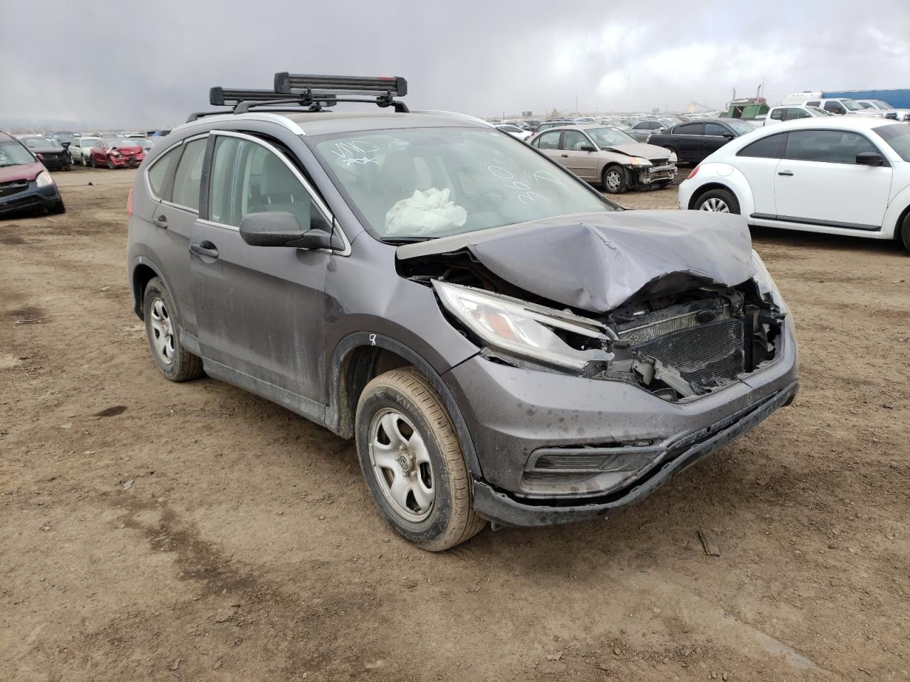 HONDA CR-V LX 2015 with VIN 5J6RM4H35FL030209 - Photo from auction