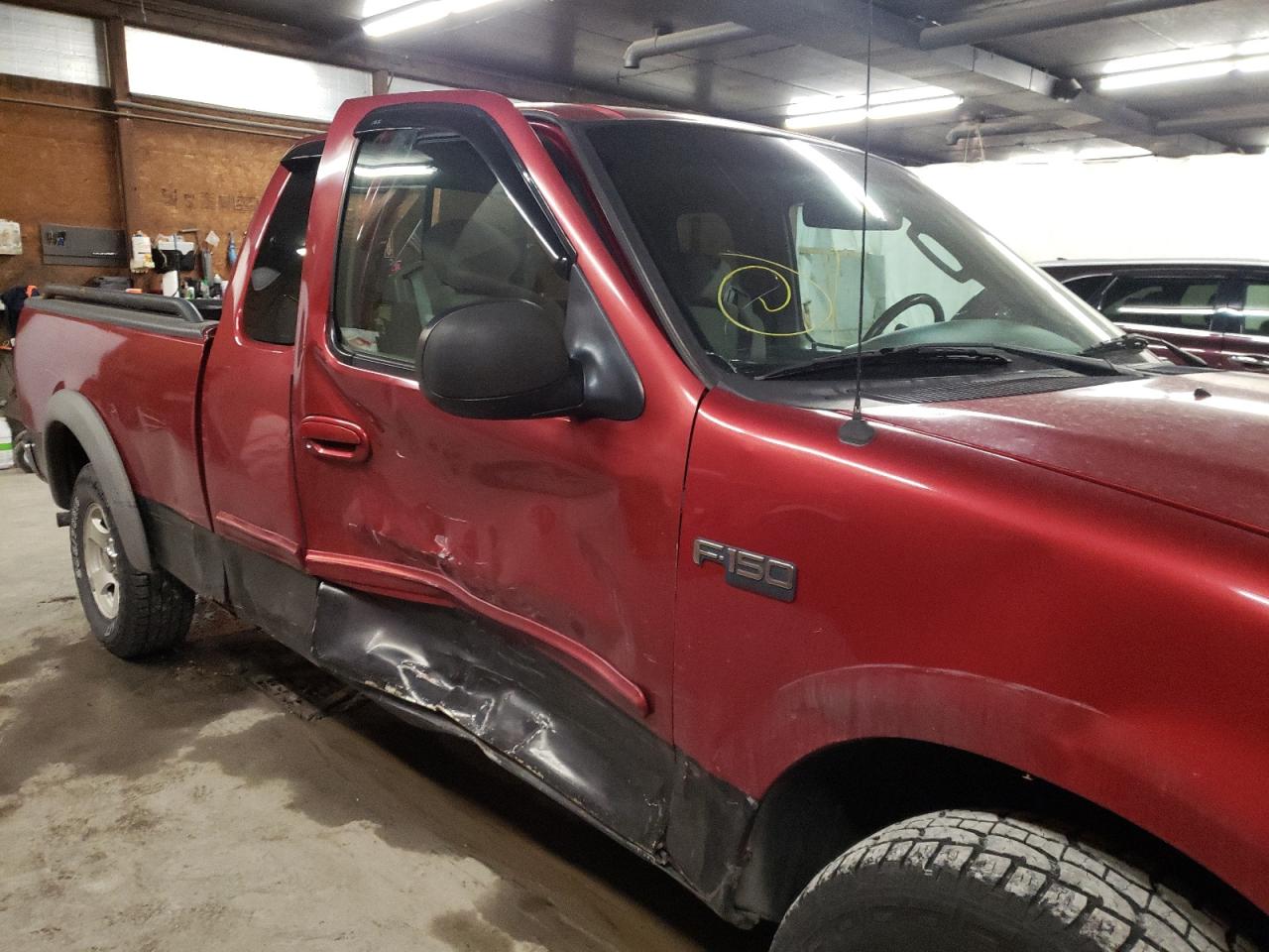 Photo 9 from auction – 2002 FORD F150 with VIN 1FTRX17222NB97162