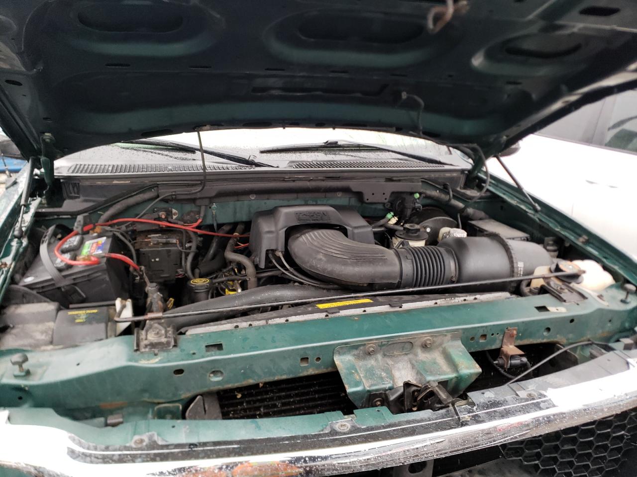 Photo 7 from auction – 2000 FORD F150 with VIN 1FTRX17L3YNB66228
