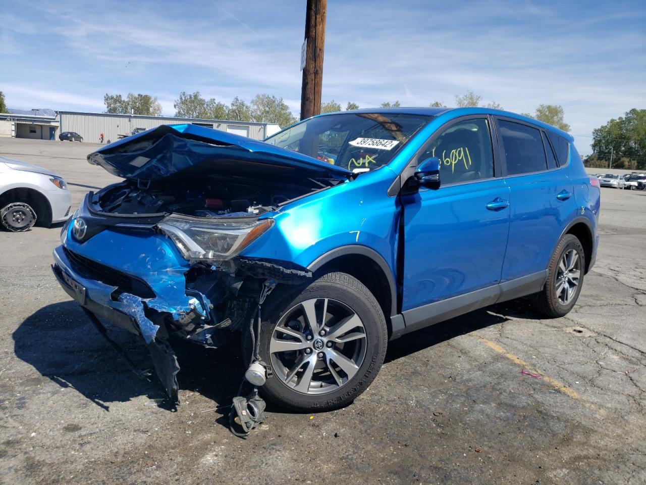 Photo 2 from auction – 2017 TOYOTA RAV4 XLE with VIN JTMWFREV7HJ149299