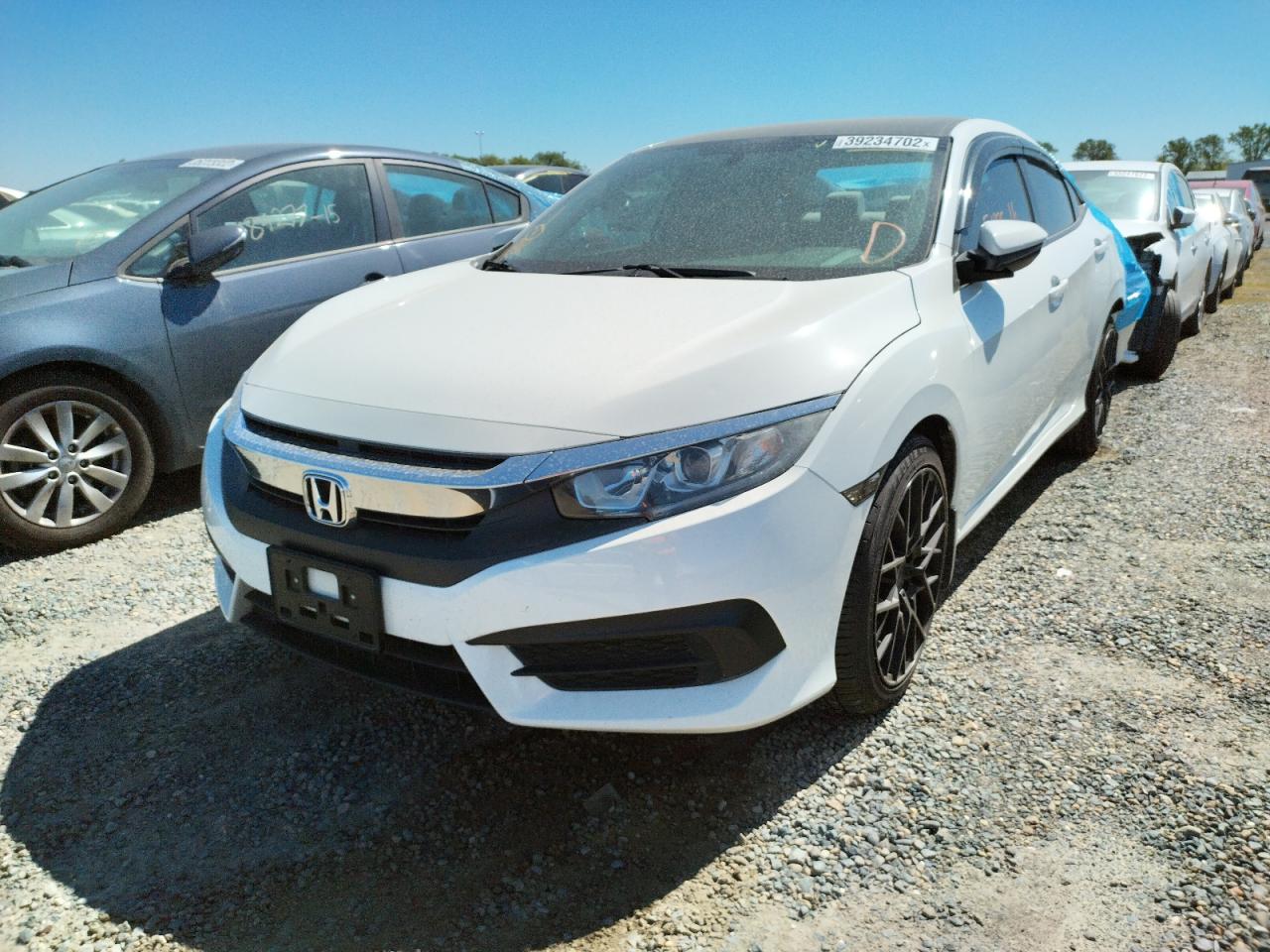 Photo 2 from auction – 2016 HONDA CIVIC LX with VIN 19XFC2F57GE200262