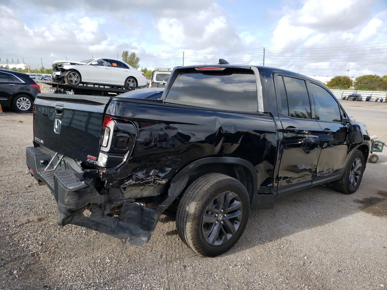Photo 4 from auction – 2021 HONDA RIDGELINE with VIN 5FPYK3F17MB017424