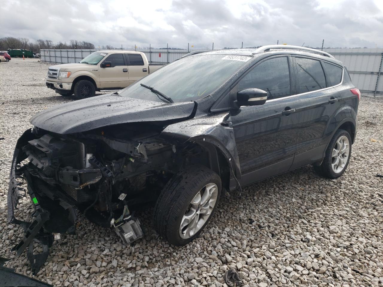 Photo 2 from auction – 2015 FORD ESCAPE TIT with VIN 1FMCU0J99FUB00898