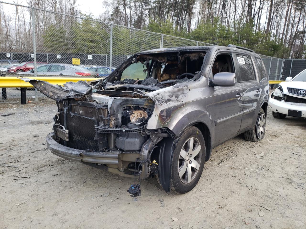 Photo 2 from auction – 2015 HONDA PILOT TOUR with VIN 5FNYF4H96FB061780