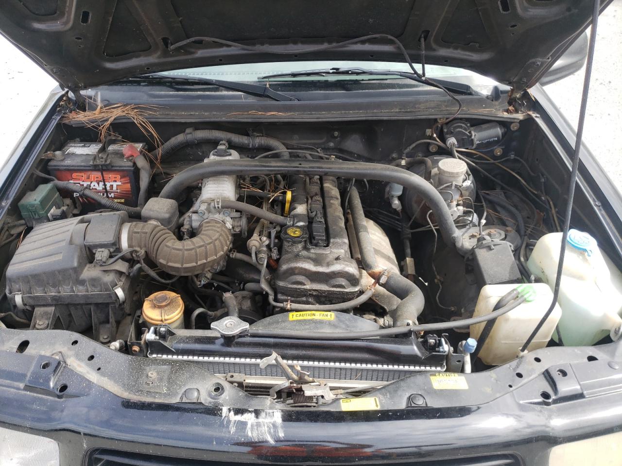 Photo 7 from auction – 2001 CHEVROLET TRACKER with VIN 2CNBE13CX16902164
