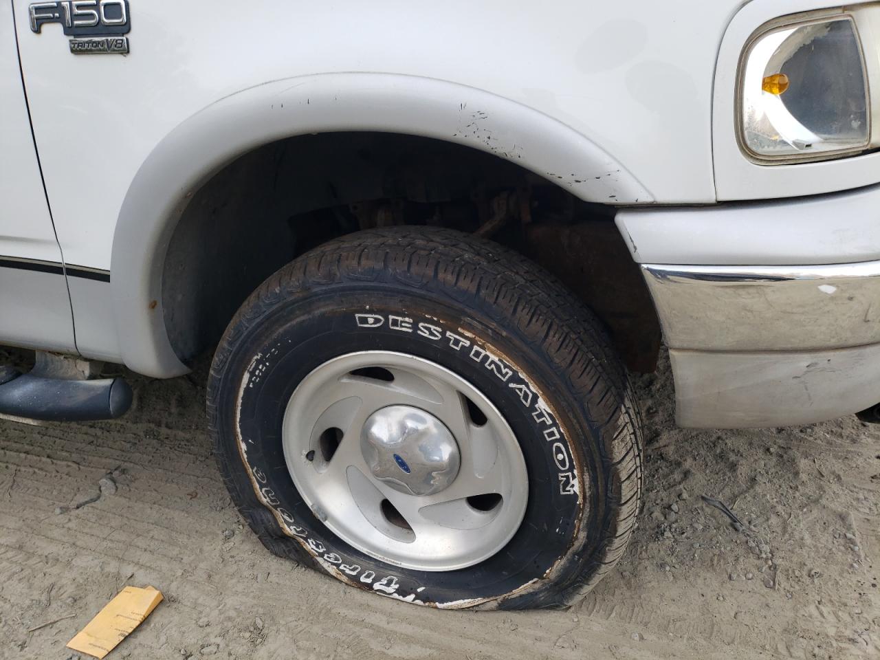 Photo 9 from auction – 1999 FORD F-150 with VIN 2FTRX08W5XCB02716