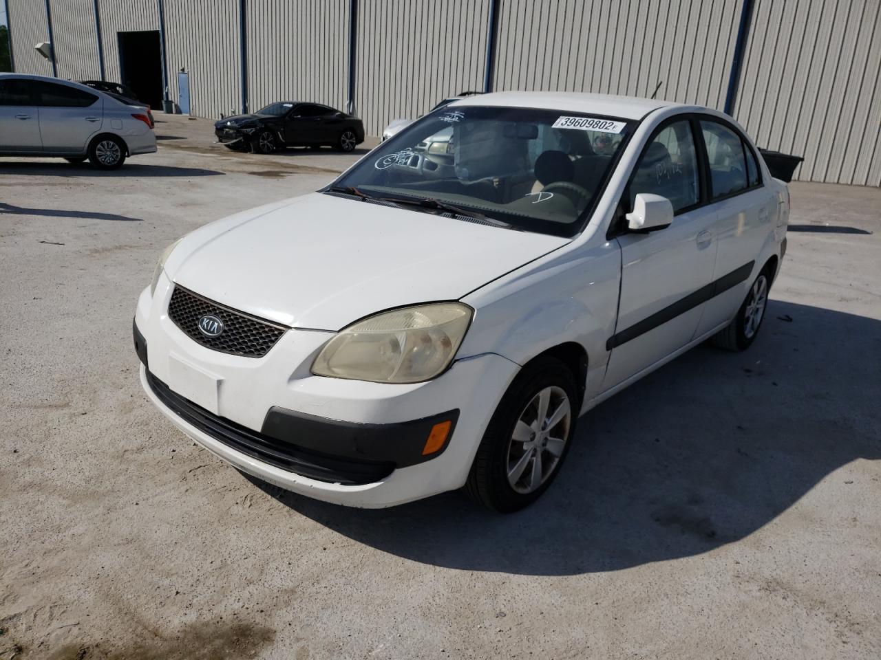 Photo 2 from auction – 2009 KIA RIO BASE with VIN KNADE223196553396