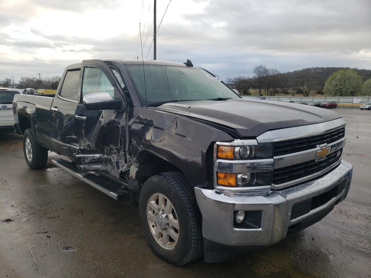 CHEVROLET SILVERADO 2015 with VIN 1GC1KWE80FF668886 - Photo from auction