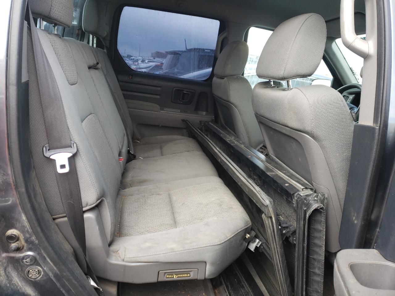 Photo 6 from auction – 2013 HONDA RIDGELINE with VIN 5FPYK1F20DB501903