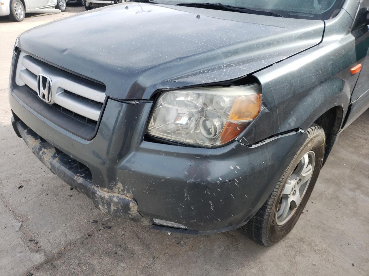 Photo 9 from auction – 2006 HONDA PILOT EX with VIN 2HKYF18606H531565