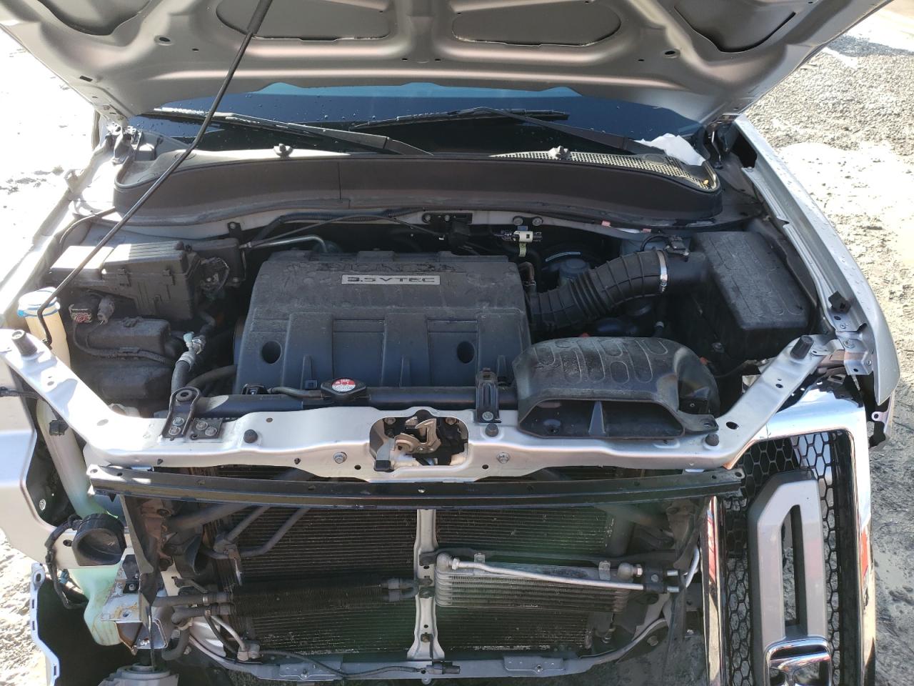 Photo 7 from auction – 2011 HONDA RIDGELINE with VIN 5FPYK1F48BB004726