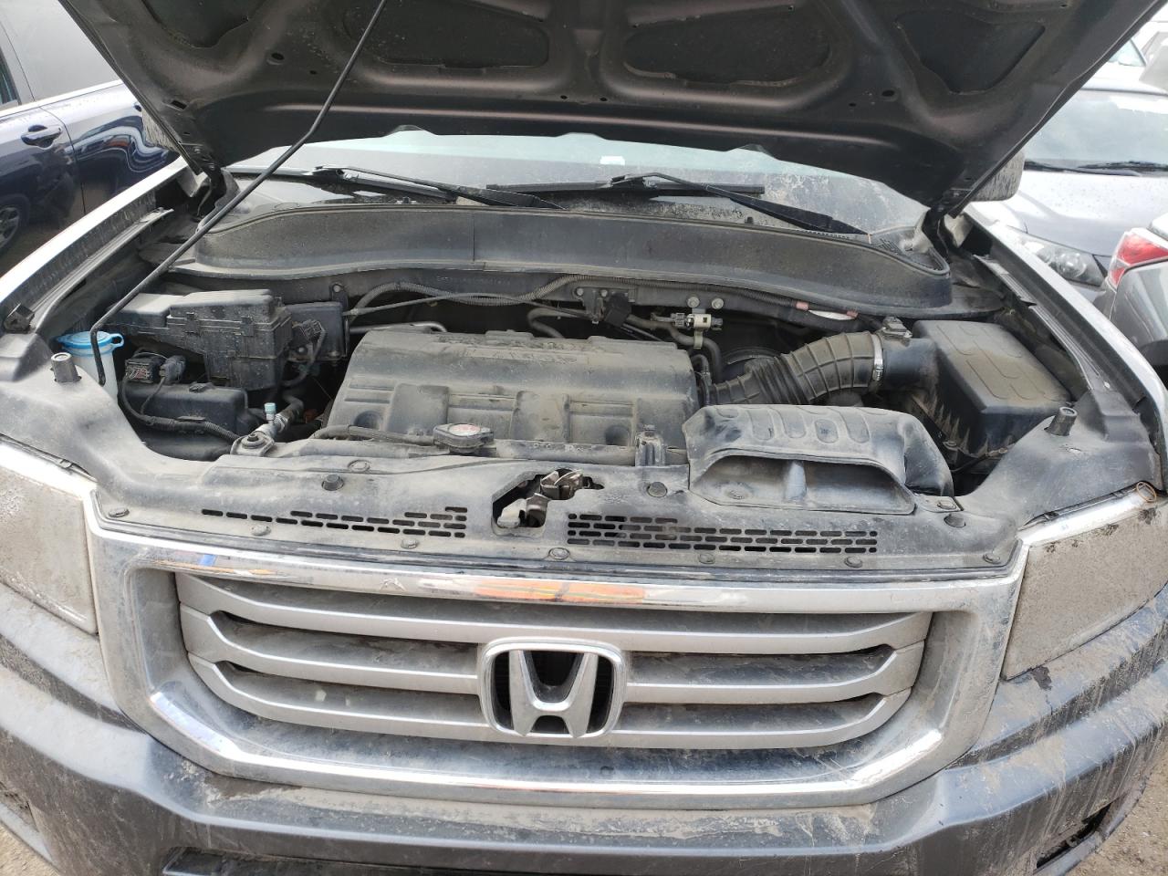 Photo 7 from auction – 2013 HONDA RIDGELINE with VIN 5FPYK1F20DB501903