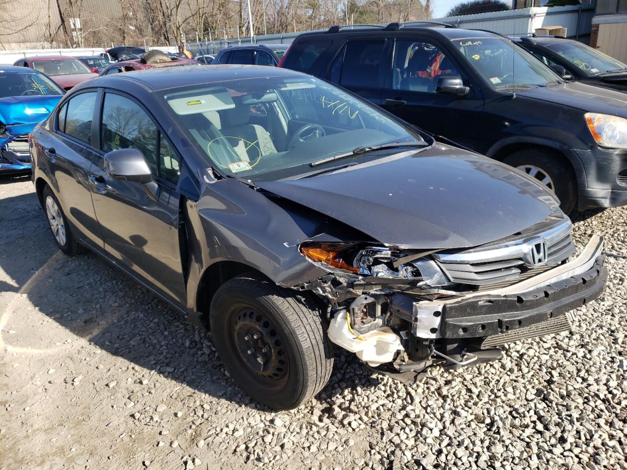 HONDA CIVIC LX 2012 with VIN 2HGFB2F5XCH558068 - Photo from auction