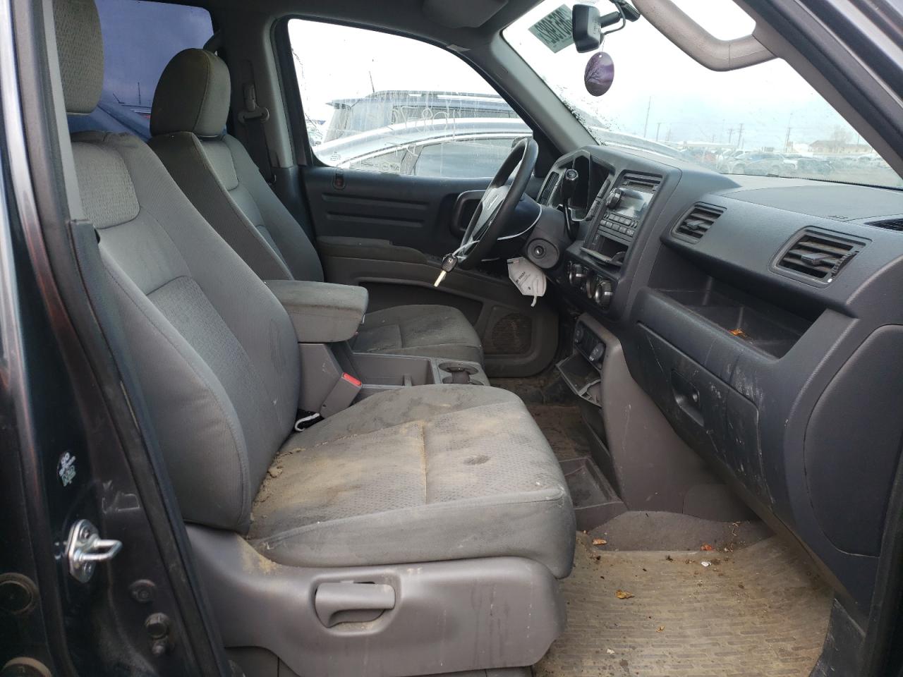 Photo 5 from auction – 2013 HONDA RIDGELINE with VIN 5FPYK1F20DB501903