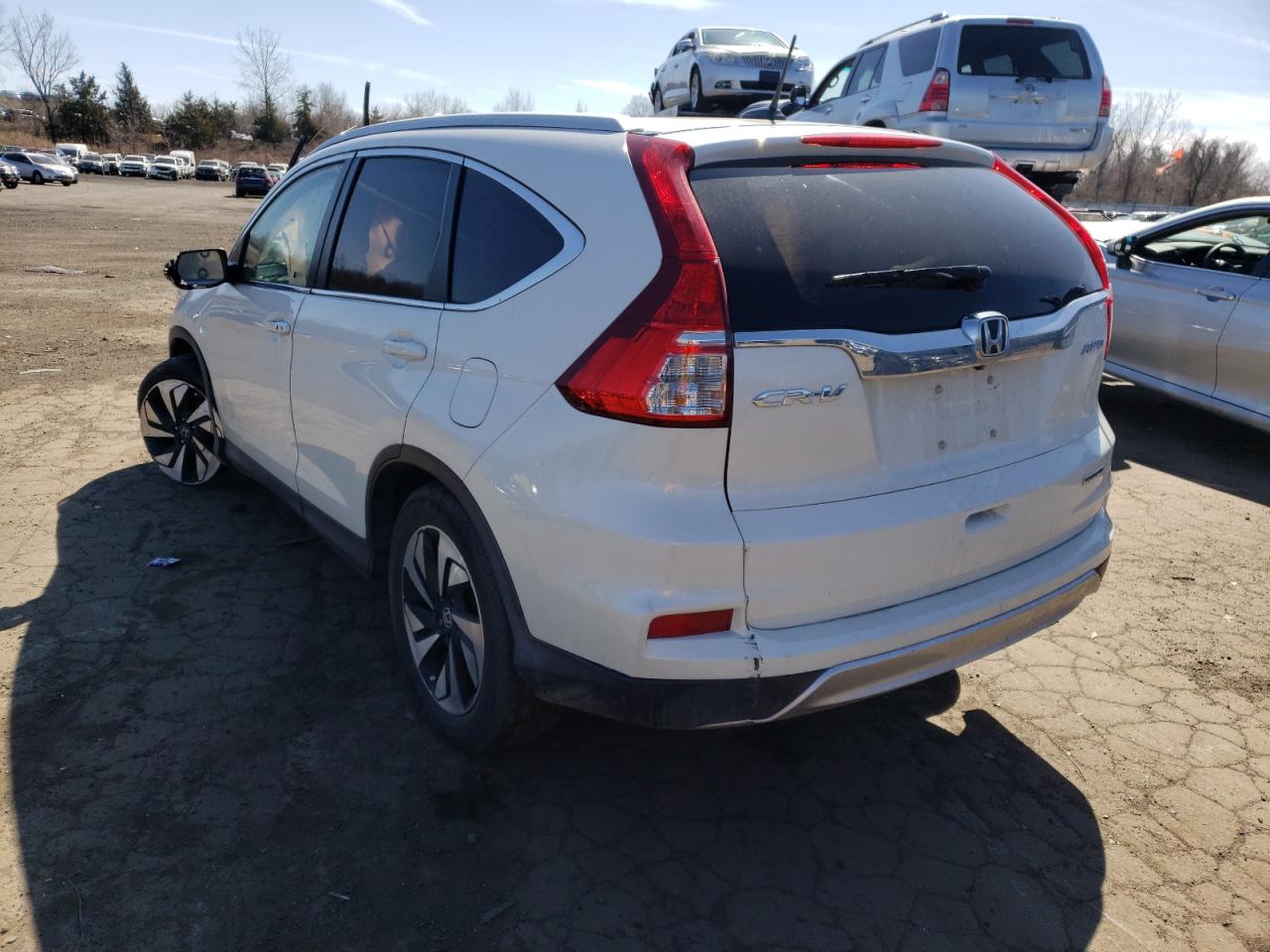 Photo 3 from auction – 2016 HONDA CR-V TOURI with VIN 5J6RM4H97GL136196