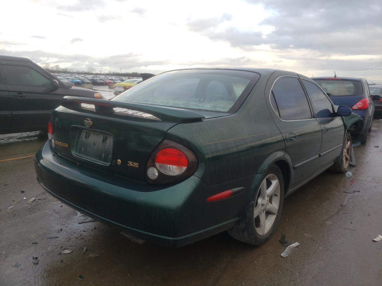 Photo 4 from auction – 2000 NISSAN MAXIMA GLE with VIN JN1CA31A2YT201575