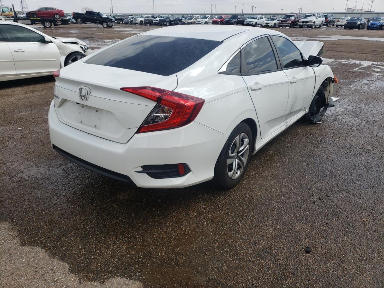 Photo 4 from auction – 2017 HONDA CIVIC LX with VIN 19XFC2F57HE062983