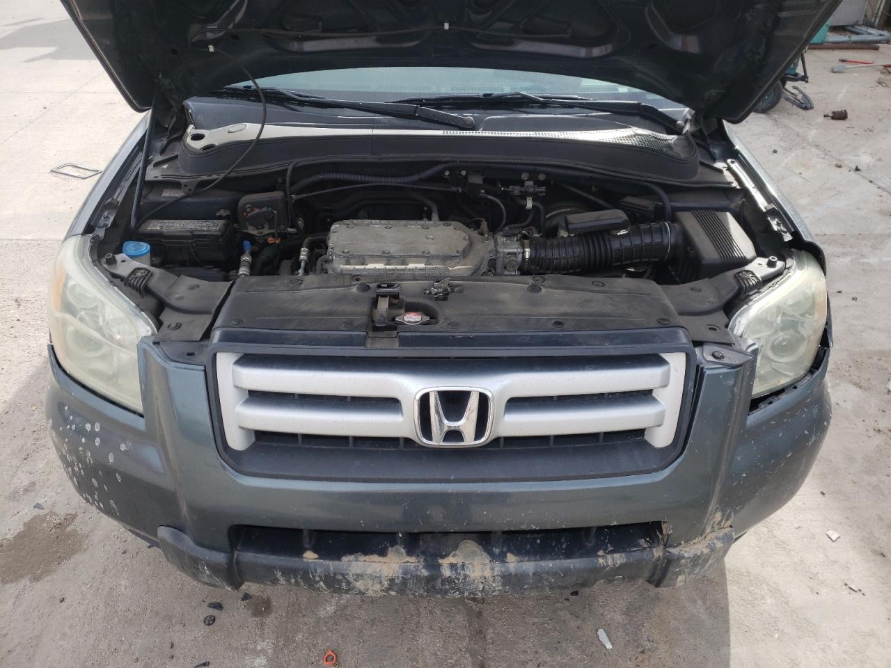 Photo 7 from auction – 2006 HONDA PILOT EX with VIN 2HKYF18606H531565