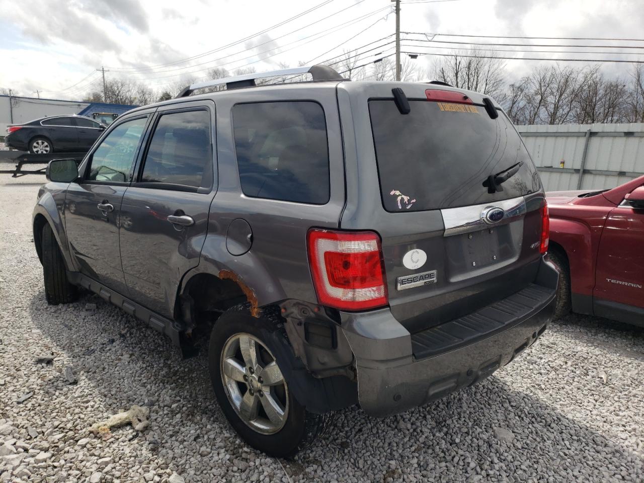 Photo 3 from auction – 2009 FORD ESCAPE LIM with VIN 1FMCU94G09KA02843